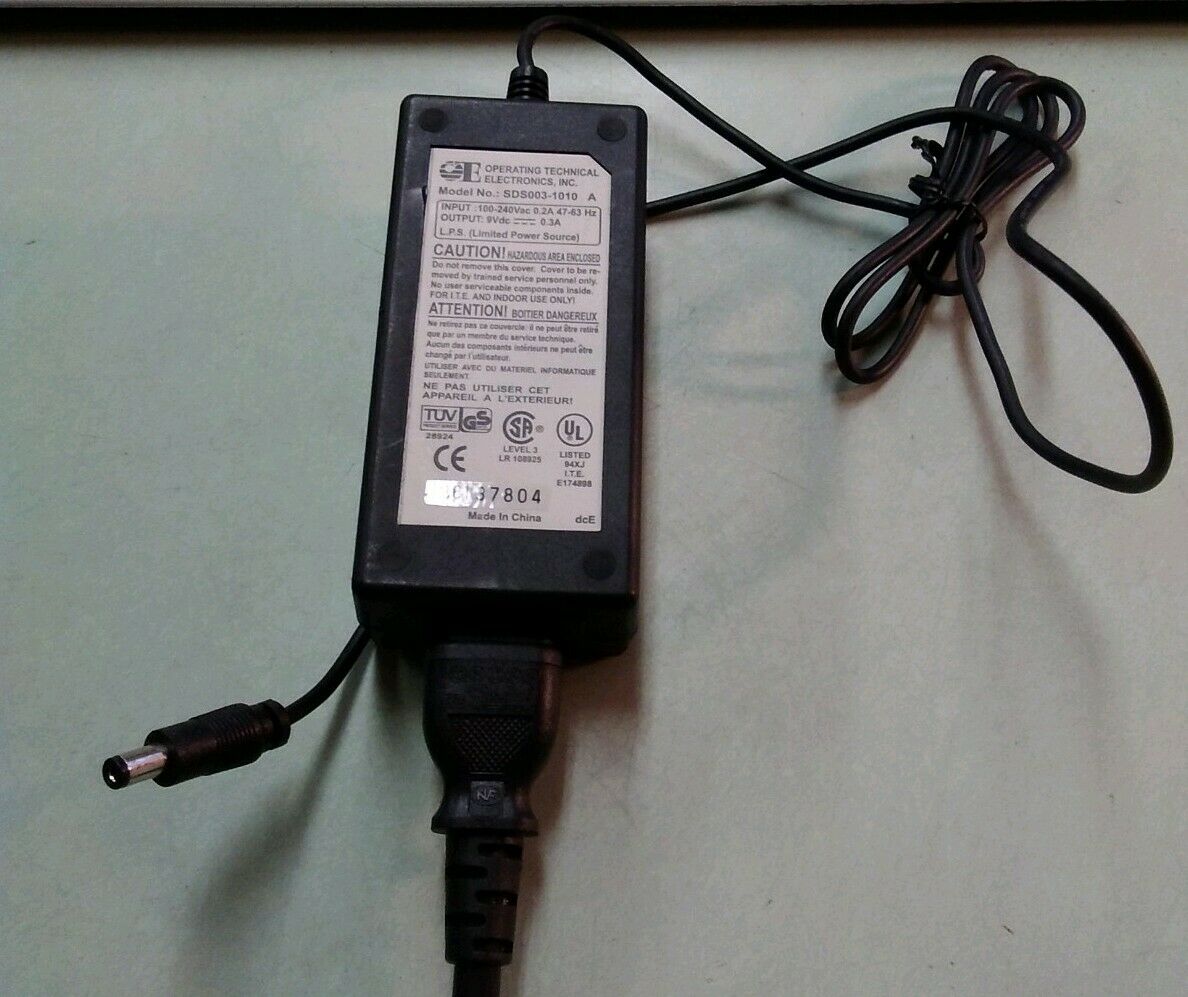 New OTE SDS003-1010-A AC Adapter 9V DC 0.3A Power Supply Transformer Charger
